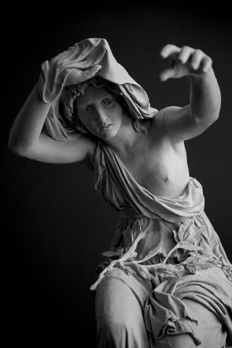 man sculpture stone