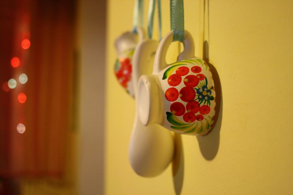 colored mugs on the wall