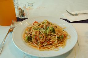 Noodles and vegetables in a restaurant