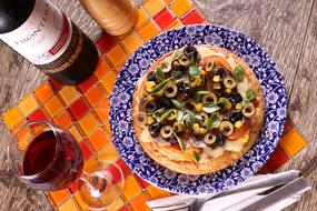 pizza with olives and cheese