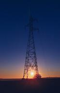 electric pylon at dusk at sunset