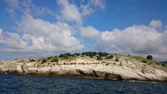 Islet Seaside Clouds