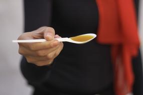 Oil in spoon