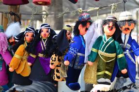 Close-up of the beautiful, colorful, traditional dolls in costumes