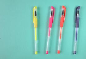 photo of four multi-colored pens