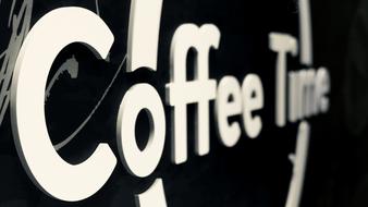 writing on the wall of the coffee shop
