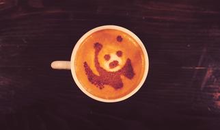 drawing of a panda in a hot drink
