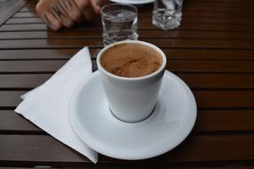 hot turkish coffee in a white mug
