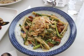 delicious hot pasta with vegetables and meat