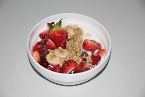 Healthy muesli with banana and strawberries