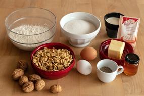 flour and eggs and nuts on the table