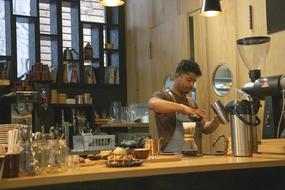barista at his desk