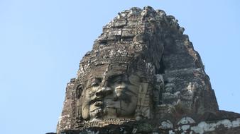 stone face with rocks