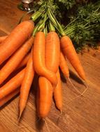 Fresh sweet carrots on the table