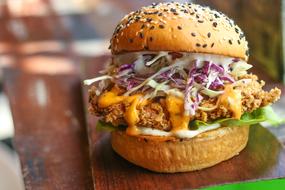 Meat burger with cheese and vegetables