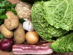 meat and fresh vegetables on the table