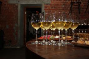 white wine in glasses on the table