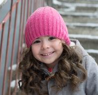 jolly girl in a pink hat