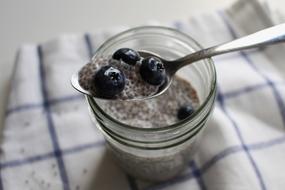 cereal with berries on a spoon