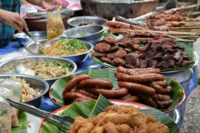 fried sausages with meat on the table