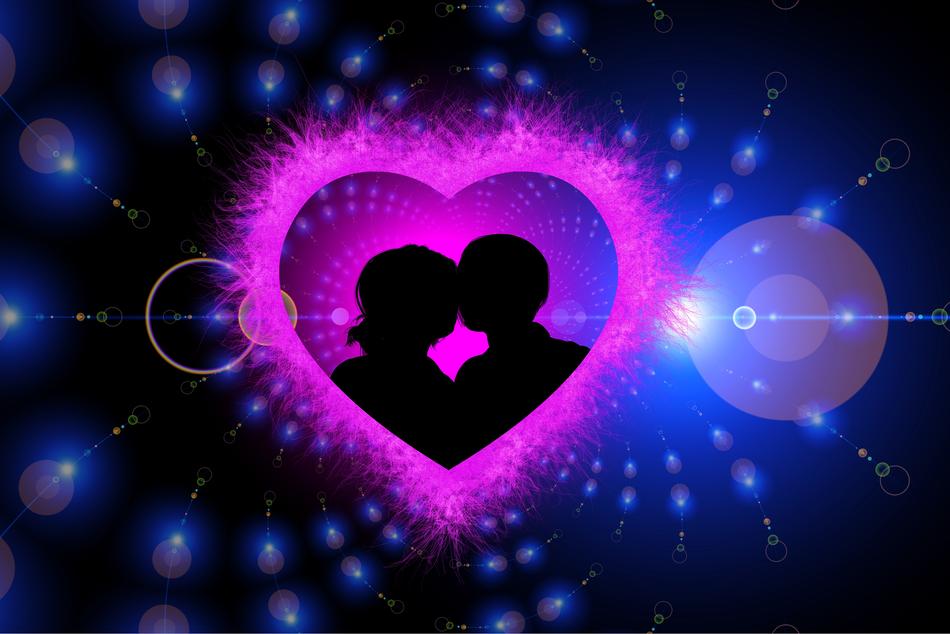 pink heart with a couple's silhouette