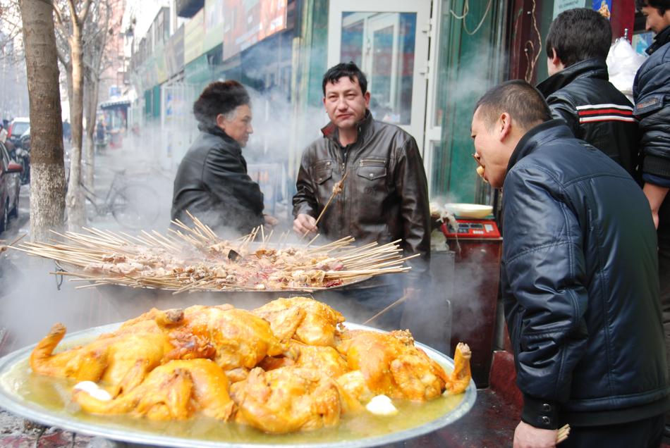 people eat at a street cafe