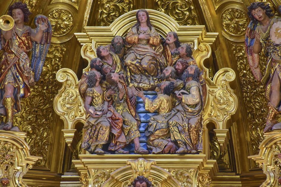 golden sculpture of religion