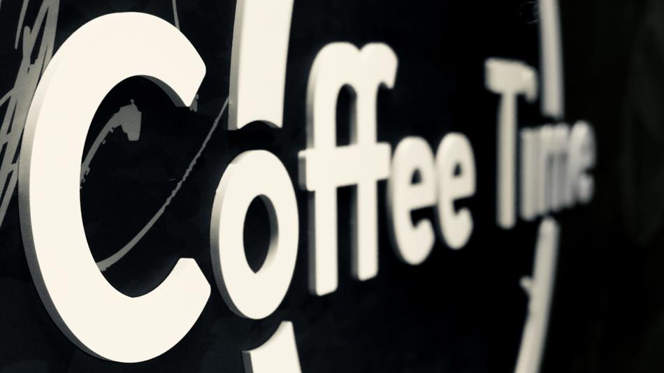 writing on the wall of the coffee shop