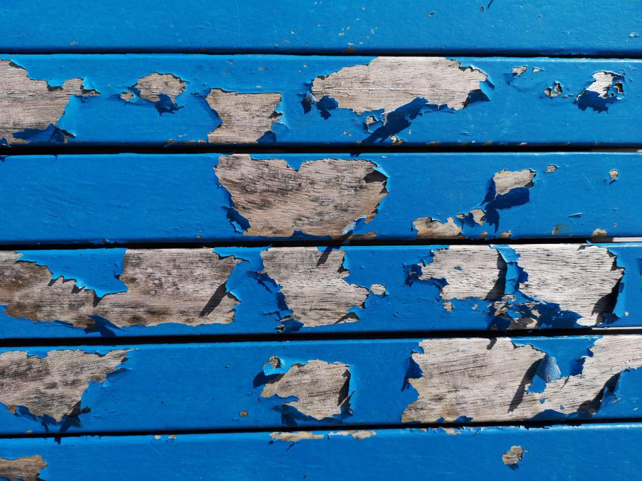 Torn paint on the wall
