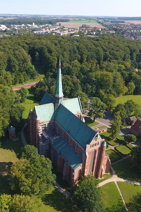 old monastery with green trees