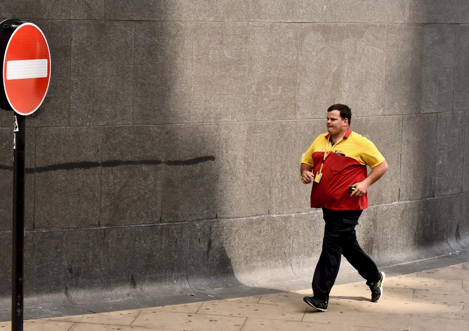 Street Photography of man and Dhl Post