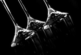 inverted glasses on a black background
