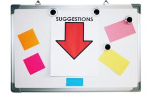 Red arrow and "Suggestions" sign, among the colorful notes, on the board, clipart