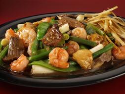 fried shrimp with vegetables in the sauce