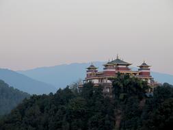 a large temple in the mountains