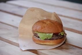 Beef burger in paper