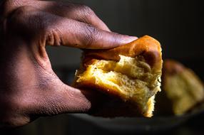 Piece of cake in hand