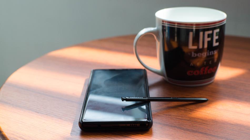 hot coffee with a black phone