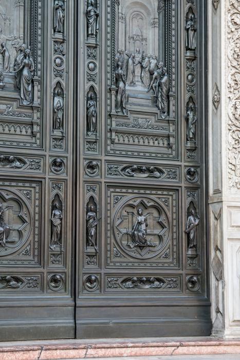 an unusual black patterned door