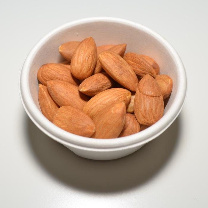 raw almonds in a plate