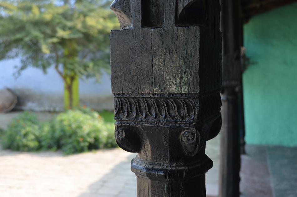wooden column holding up the roof