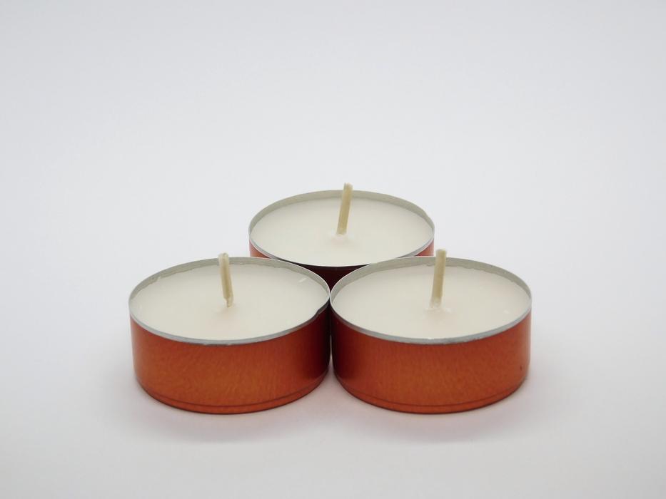 candles in an iron thing