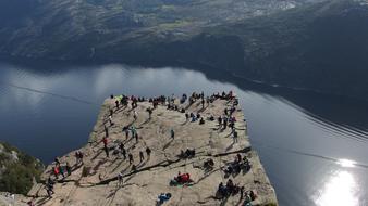 landscape of tourists on clifff