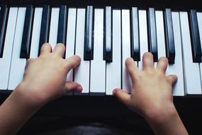 Piano Key kid hands