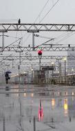 Woman With Umbrella Snowy Railway