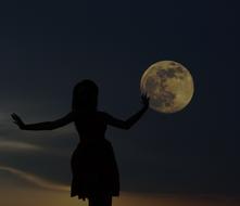 Girl and Full Moon photo