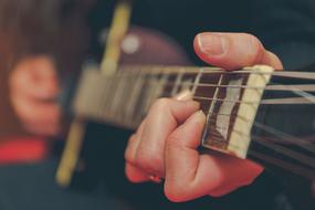 Guitar with Hand