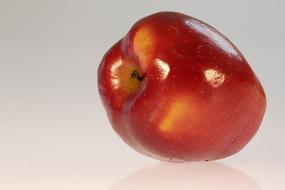 juicy red apple on a white background