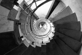 monochrome photo of Level spiral stairs