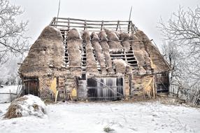 abandoned barn in the snow